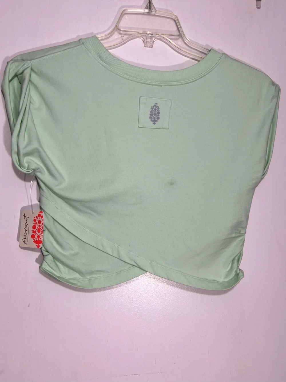 NWT FP Movement Pistachio green hot shot crossover top size L